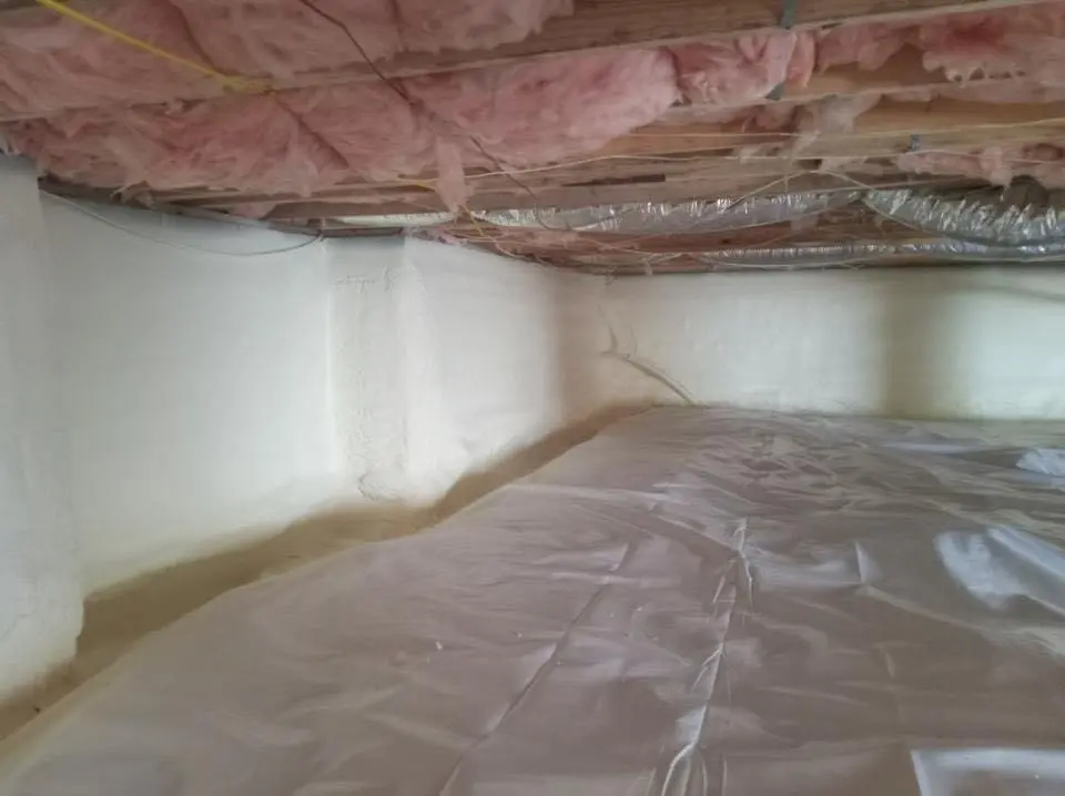 Crawl space encapsulation with closed-cell spray foam for Commercial Roof Restoration in Senoia